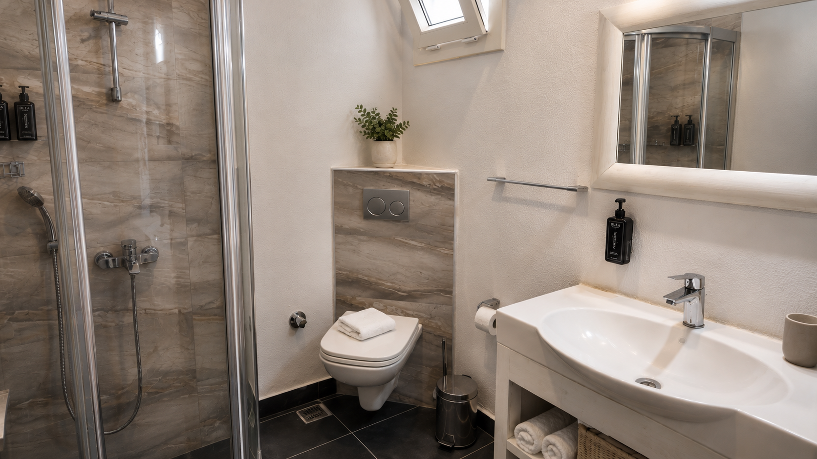 Standard room bathroom with marble shower