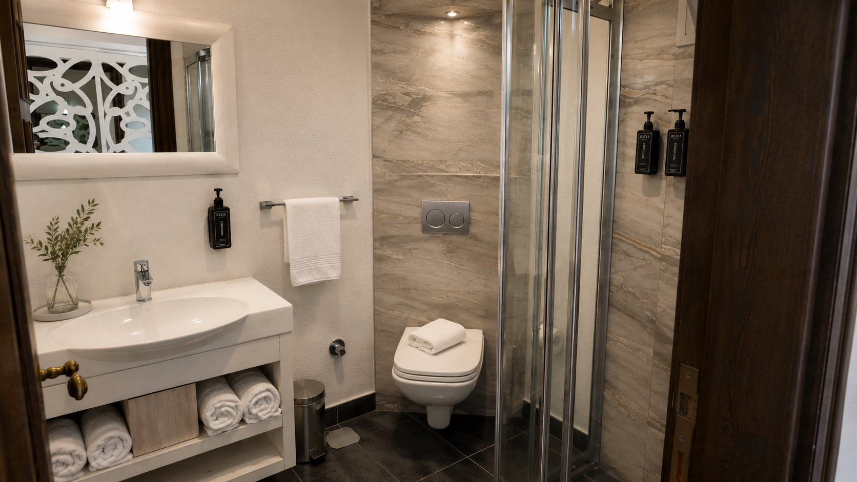 Deluxe room bathroom with shower and vanity